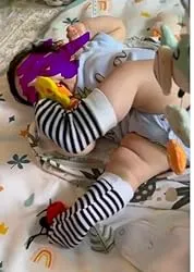 CuddleCritter Garden Rattle Set: Adorable Baby Socks & Wrist Rattles for Playful Adventures