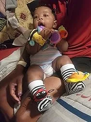 CuddleCritter Garden Rattle Set: Adorable Baby Socks & Wrist Rattles for Playful Adventures